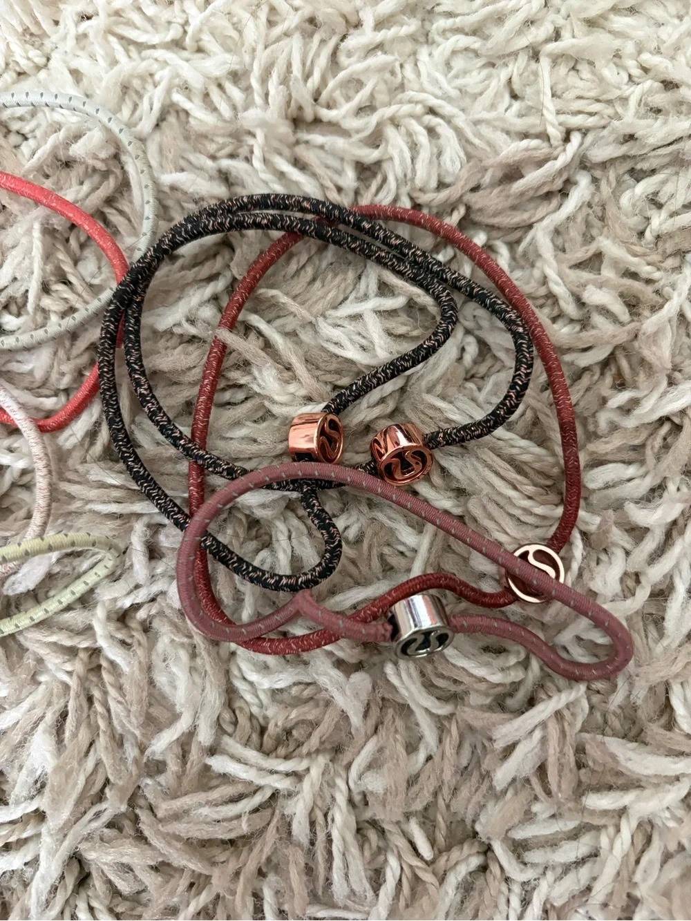 Lululemon hair tie bundle Set - Coral, Black, Olive, Cream lot of 7